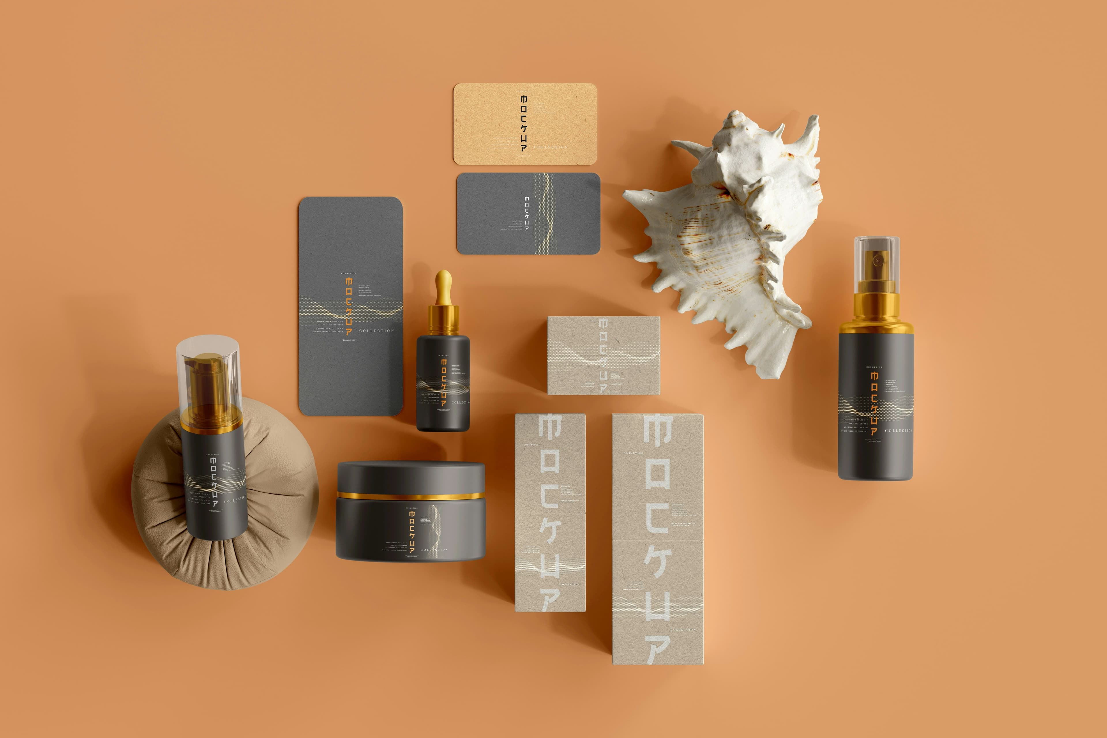 Skincare bottles and packaging arranged on a warm orange background alongside decorative seashells.